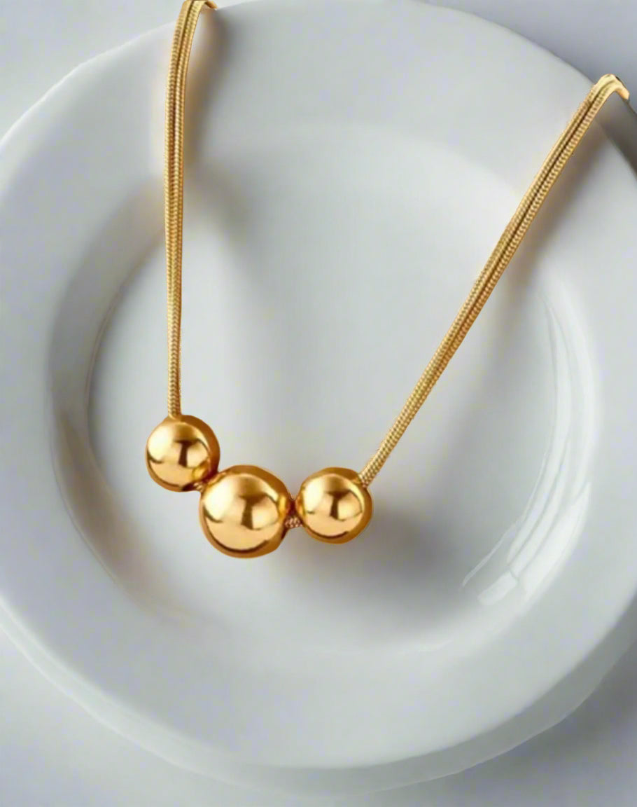 Collar Renace- Diseño de tres bolas